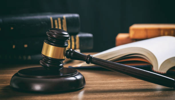 istock Law gavel on a wooden desk 1005217042