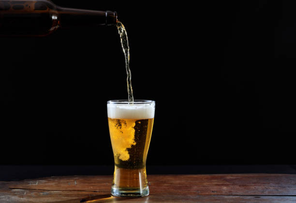 istock Pouring beer in a glass 1005222230