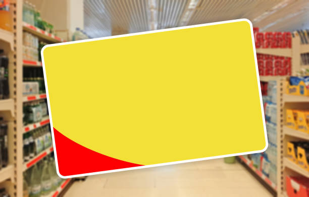 istock Yellow blank label on a blur Supermarket 1005222680