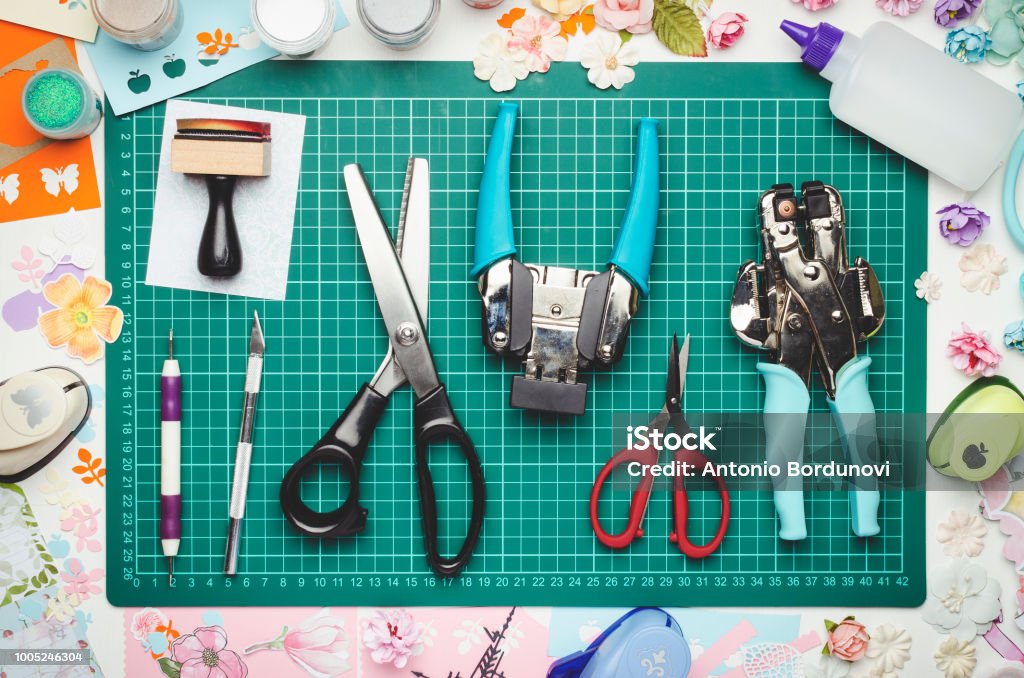Tools For Scrapbooking And Creativity On Green Cutting Mat Stock Photo -  Download Image Now - iStock