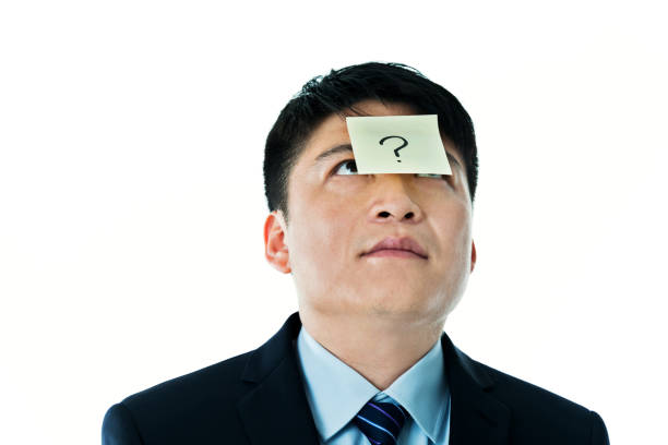 istock Businessman with question mark on the forehead 1005254250