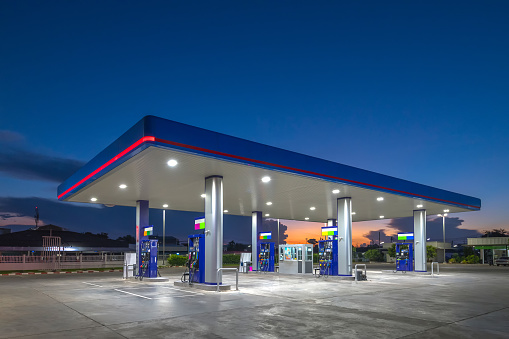 Gas fuel station with sunrise sky