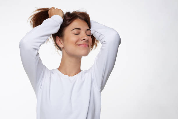 istock Delightful positive female expresses happiness, has broad charming smile 1005270666