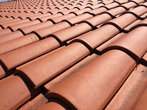 Close-up of roof tiles on bright sun