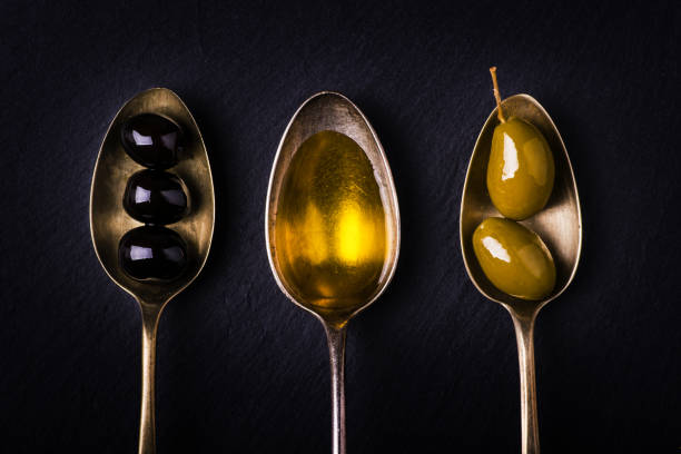 istock olives and extra virgin olive oil. Still life 1005288164