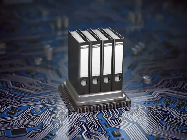 Photo of Database archive data storage concept. Binders on CPU processor and motherboard