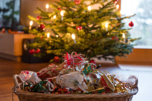 Packaging waste under the christmas tree stock photo