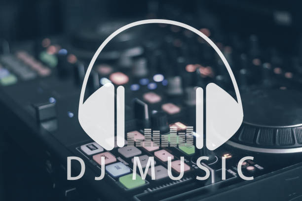 istock Hands of dj tweak various track controls on dj's deck,selective focus, close up. Dj Music concept.Black headphones for professional disc jockey. 1005339974