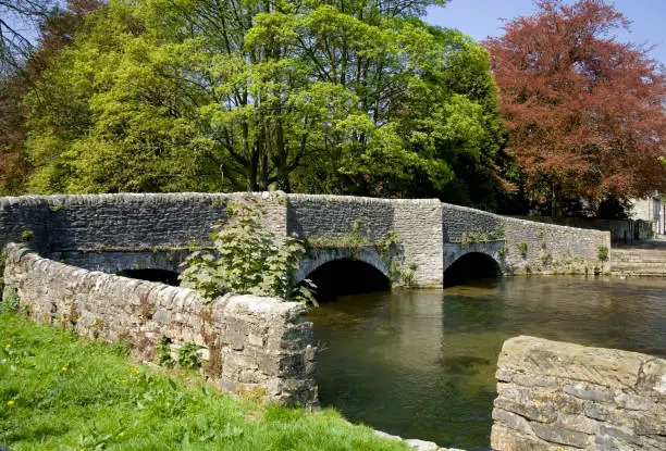 medieval stone packhorse bridge ashford in the water peak district national park derbyshire england uk