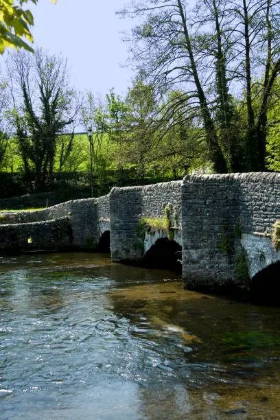 medieval stone packhorse bridge ashford in the water peak district national park derbyshire england uk