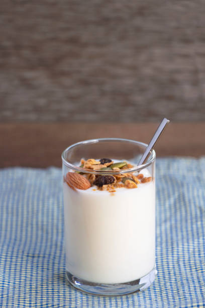 Prepare yogurt and dried fruit for breakfast every day. Yogurt made from milk fermented by added bacteria, often sweetened and flavored.