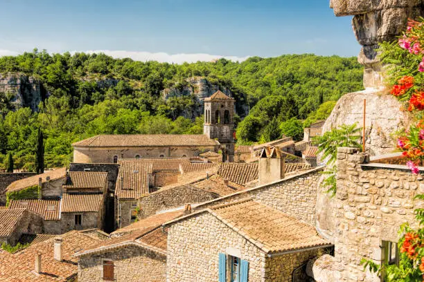 Fantastic view of the tower of Saint Pierre church and the old houses in the French community Labeaume at the Ardeche