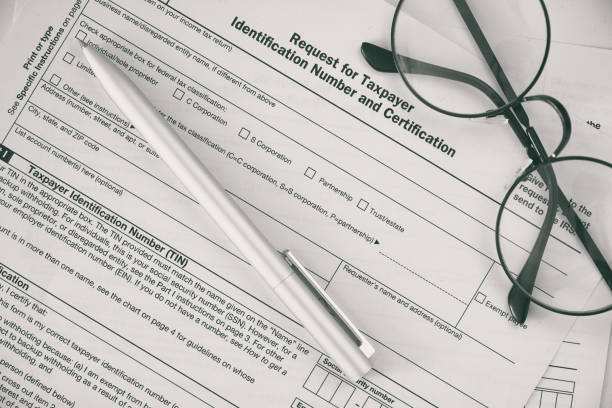 istock Federal income tax laws W9 form 1005362464
