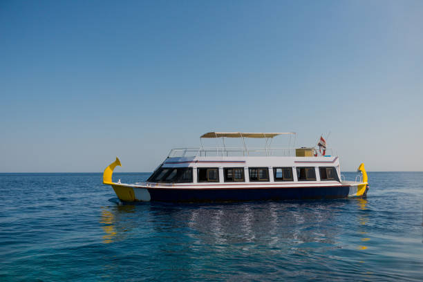 istock tour boat in open sea 1005362726
