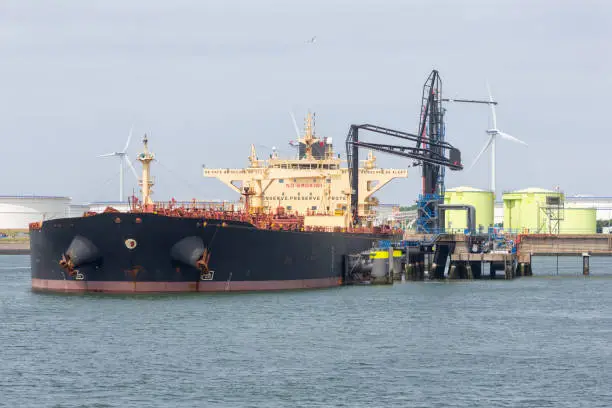 Oil tanker in harbor Rotterdam of The Netherlands, biggest seaport of Europe