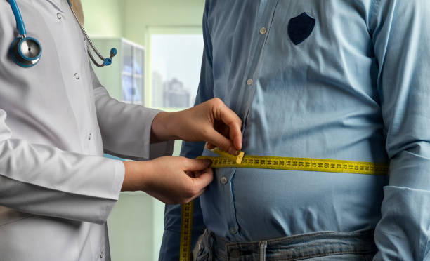 medición con sobrepeso - medida de peso fotografías e imágenes de stock