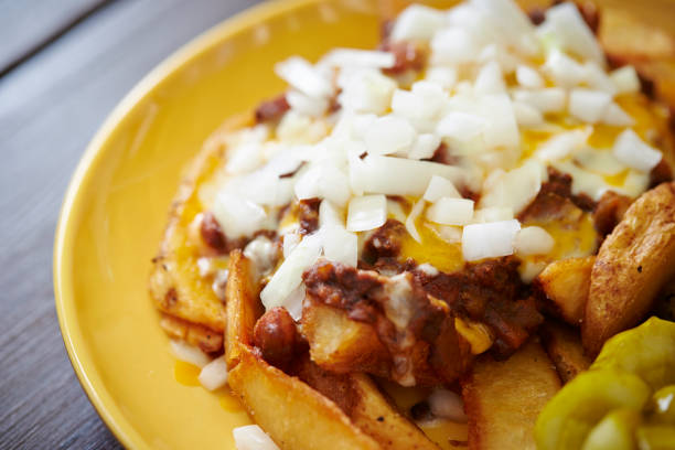 istock Potato wedges and chili beans 1005374872