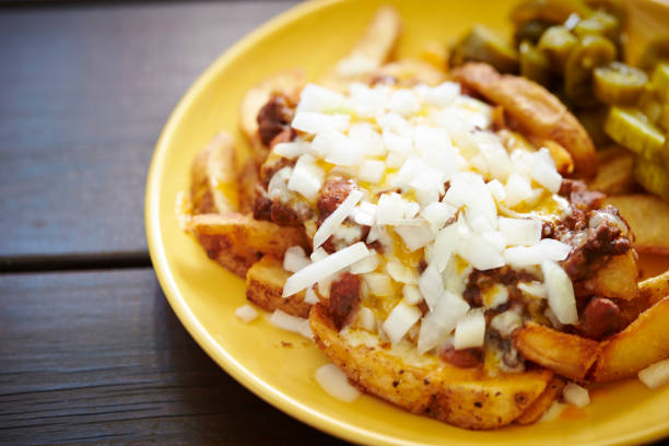 istock Potato wedges and chili beans 1005374906