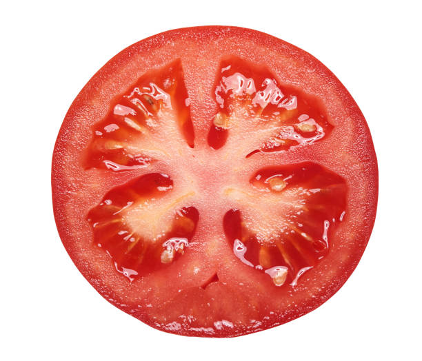 istock Slice of tomato isolated. clipping path 1005378570