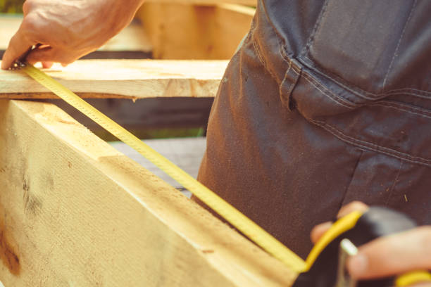 istock the worker makes measurements with a tape measure 1005381814