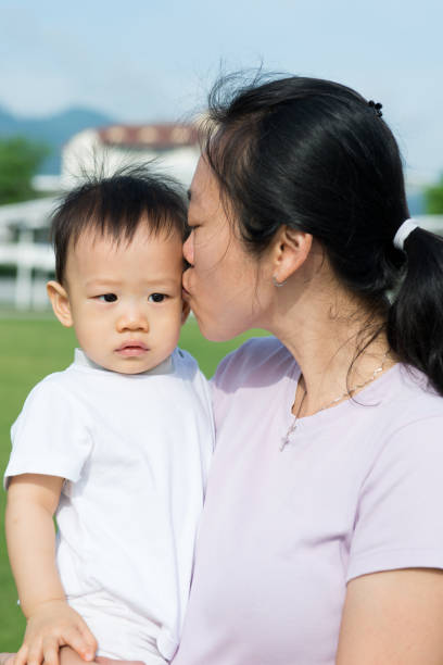 istock Portrait of mother and son 1005390970
