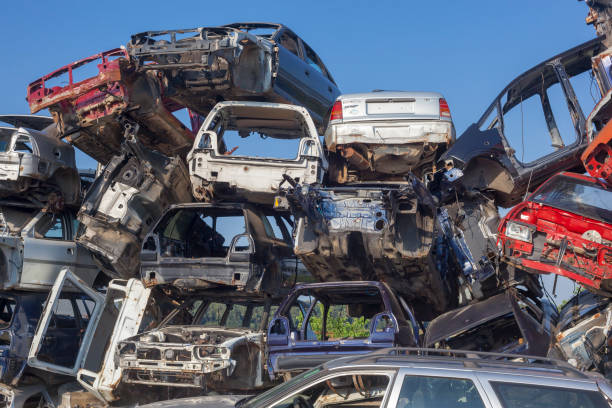 istock Car junkyard - old vehicles are waiting for recycling 1005394106