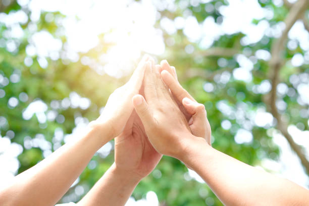 istock Hand of people assemble corporate Meeting Teamwork and harmonious Symbol 1005398752