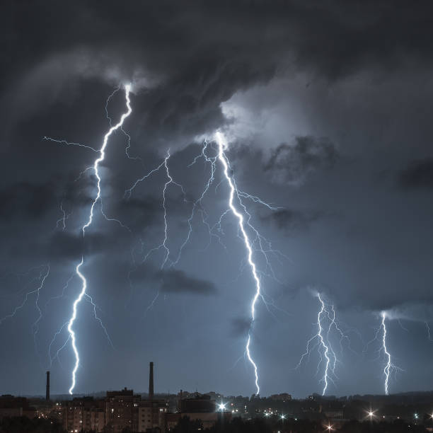 istock Lightning parade in the night city 1005431600