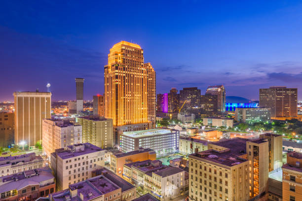 New Orleans, Louisiana, USA New Orleans, Louisiana, USA downtown CBD skyline at night. new orleans stock pictures, royalty-free photos & images