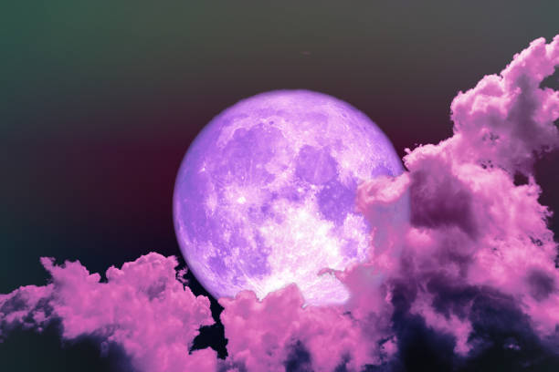 istock super full purple moon back silhouette colorful sky 1005435228