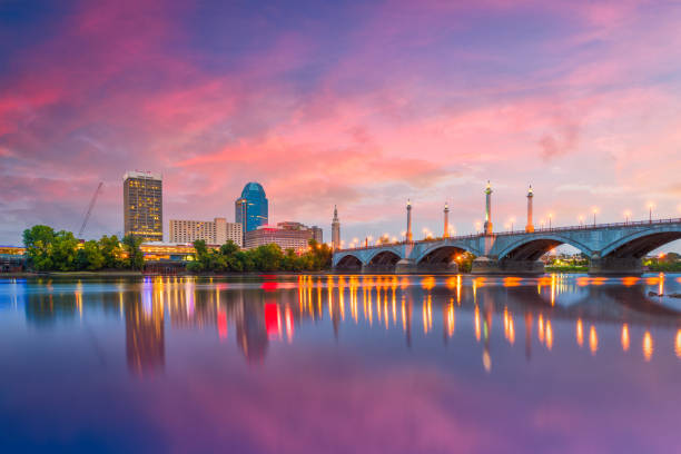 Springfield, Massachusetts, USA Springfield, Massachusetts, USA downtown skyline on the river at dusk. massachusetts stock pictures, royalty-free photos & images