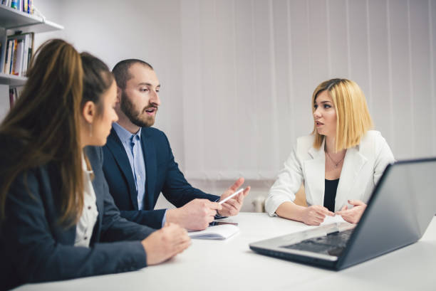 istock Coworkers in a conference room 1005436434