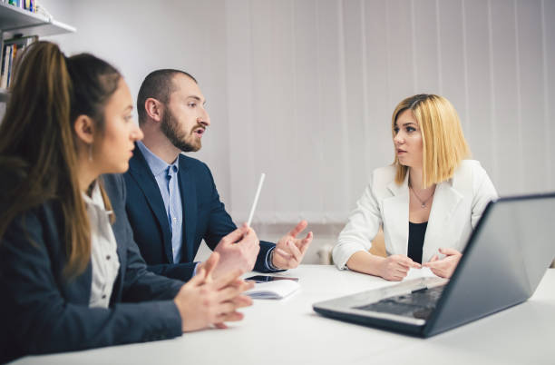 istock Coworkers in a conference room 1005439204