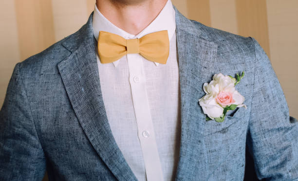 istock elegant groom men grey jacket rose buttonniere 1005439766