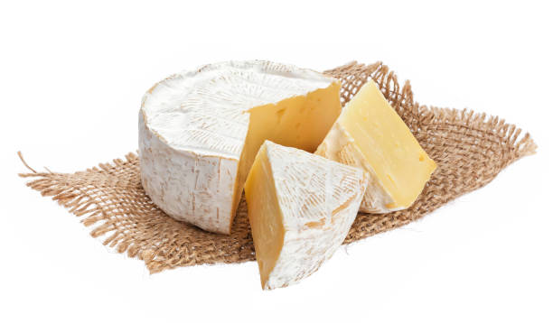 istock Camembert cheese isolated on white background with clipping path 1005453590