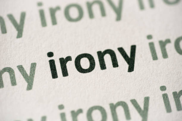 parola ironia stampata su carta macro - irony foto e immagini stock
