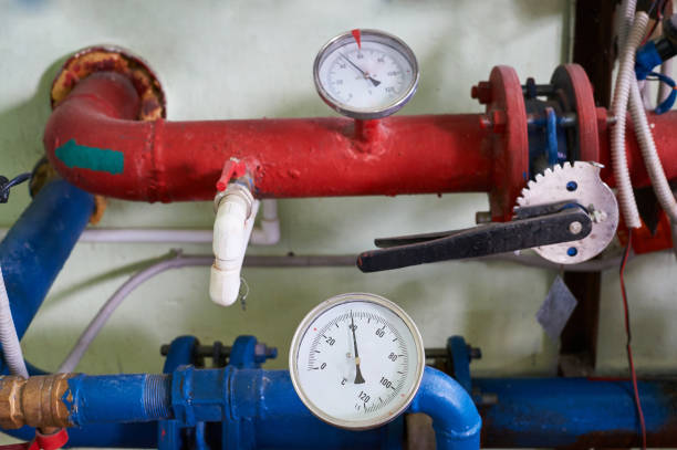 istock Temperature sensors installed on the hot and cold water pipeline. Industrial background. 1005460164