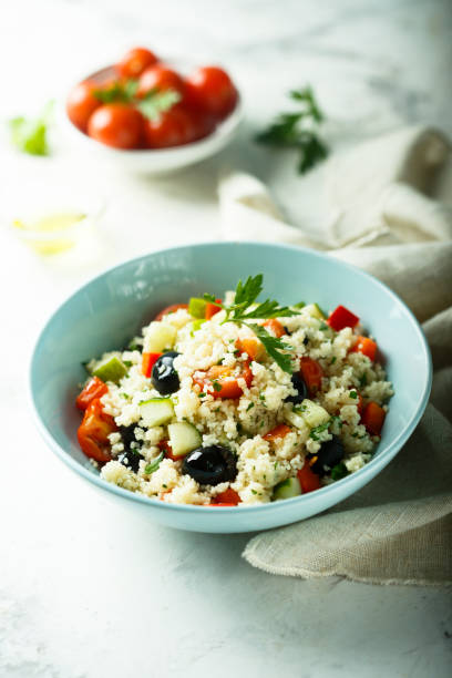 istock Couscous salad with olives and tomatoes 1005462346