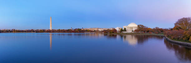istock Jefferson Memorial and Washington Monument reflected on Tidal Basin in the evening. 1005466578