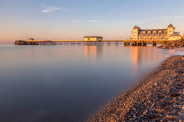 istock Golden Sunrise at Penarth Pier 1005469682