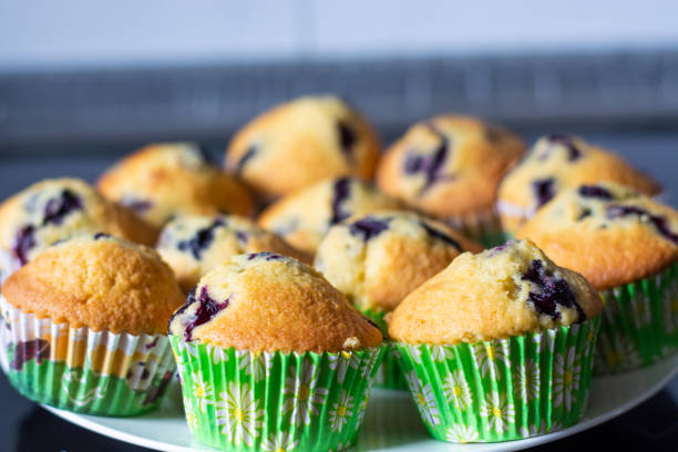 istock A plate full of blueberry muffins close up 1005469782