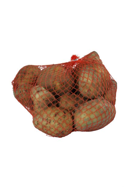 istock Sack of isolated potatoes on white background 1005480738