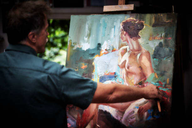 istock artist painting in art studio 1005513174