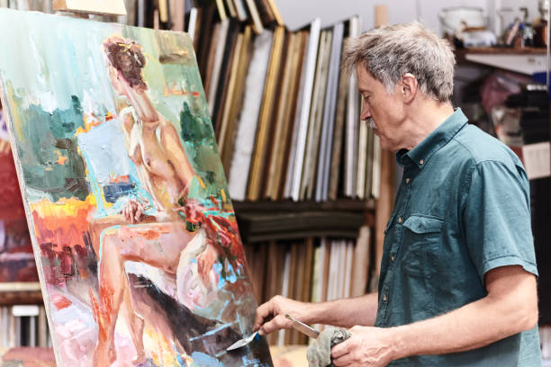 istock artist painting in art studio 1005513594