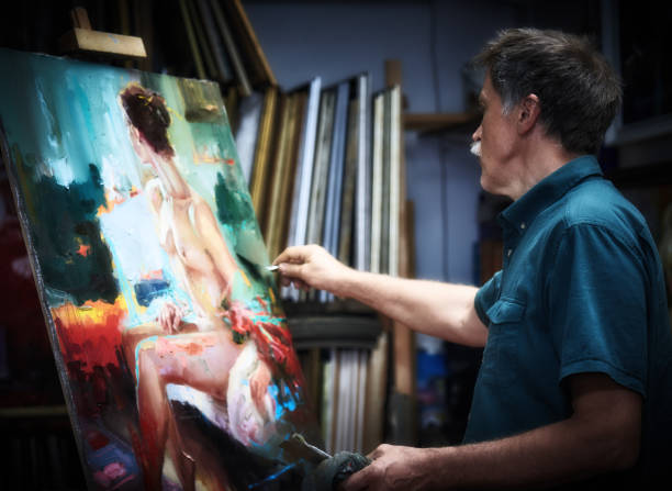 istock artist painting in art studio 1005513630