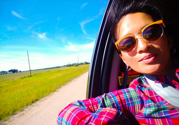 istock Woman Taking Selfie Passenger Car Vehicle Alberta 1005520658