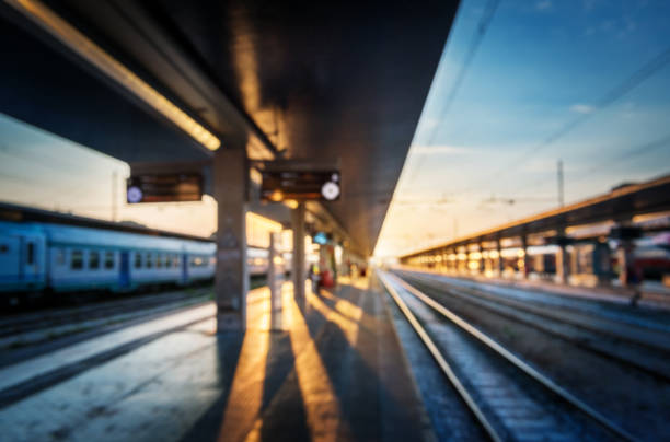 Railway station Venice city with blur effect against colorful sunset sky, Industrial, transportation, travel concept background. Railroad blured background.