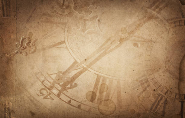 istock Old clock dials and hour hand on vintage brown paper background. 1005524404
