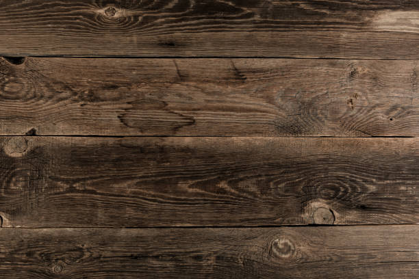 istock Wooden background. Texture with an old, rustic, brown planks 1005534558