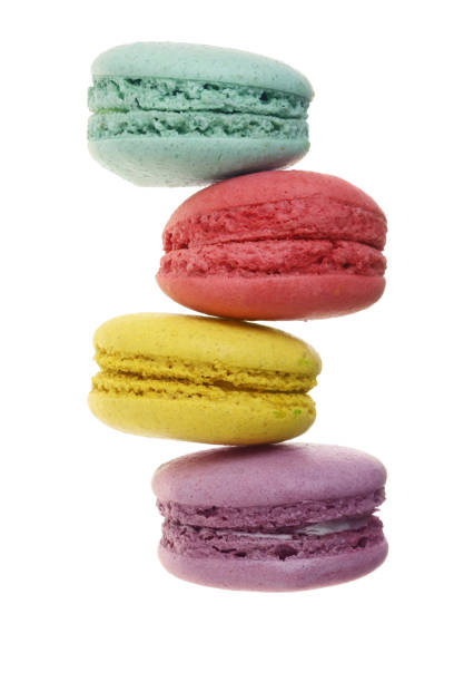 istock colored macaroons isolated on white background without a shadow closeup. Top view. Flat lay 1005552902